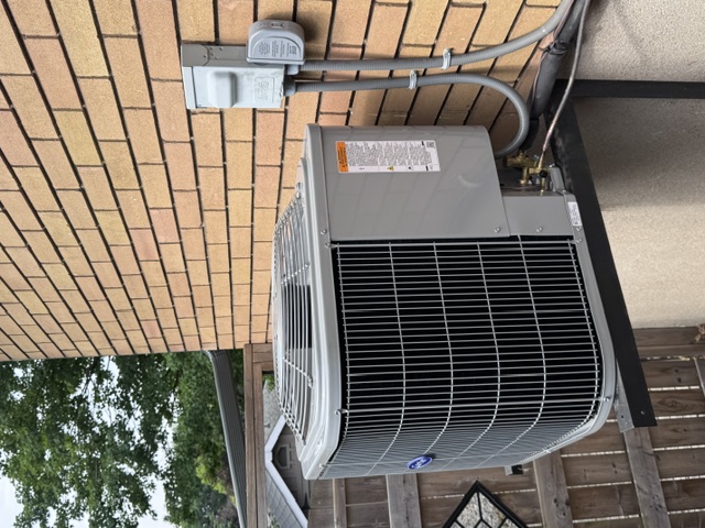 Wall-mounted Carrier air conditioner installed by Infiniti Air