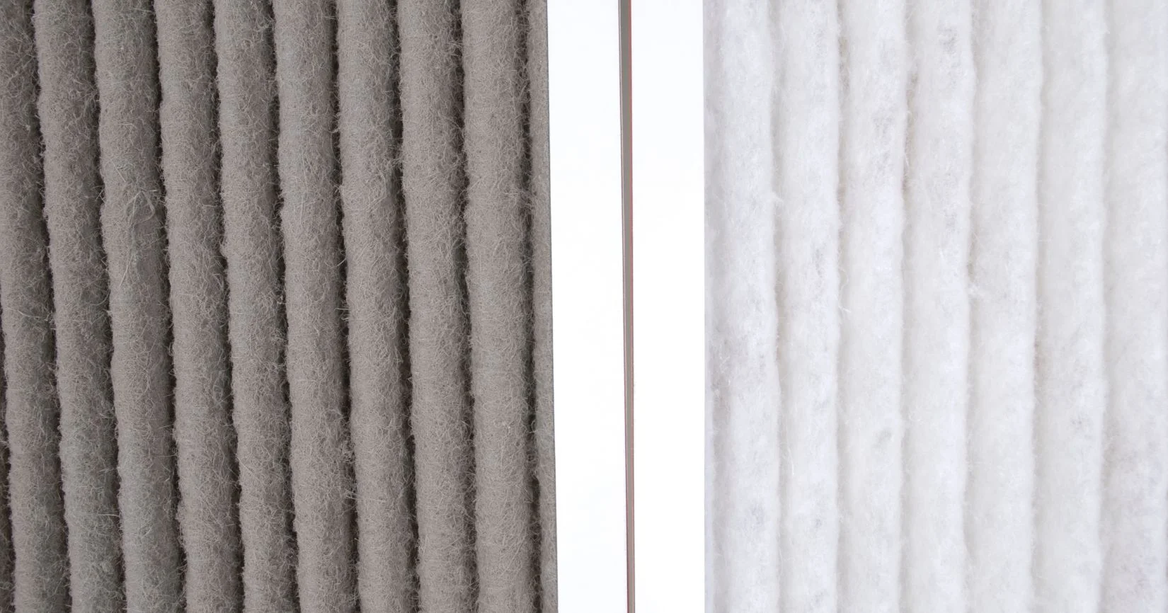 Comparison of dirty and clean furnace air filters side by side